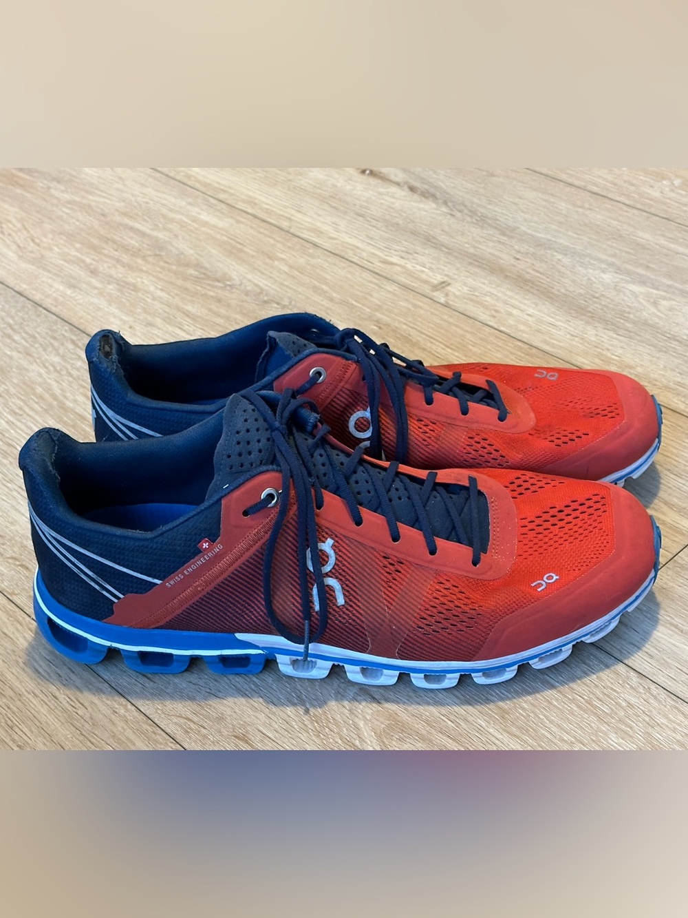 On Running Men’s CloudFlow Road Shoes Rubber Trimmed Red and Navy Running Shoes